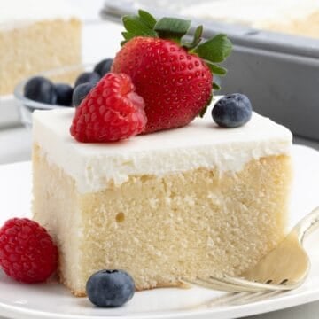 square slice of berry white chantilly cake from 9x13" pan