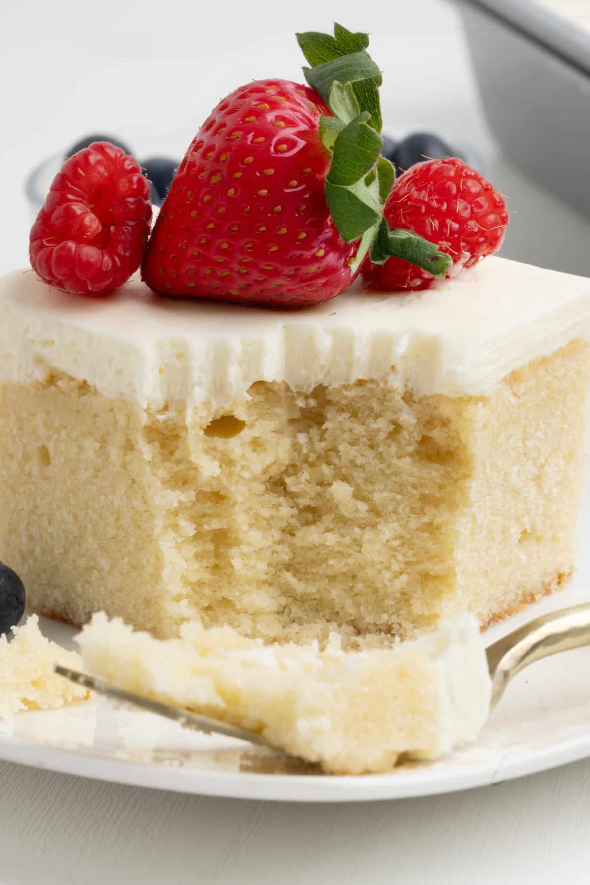 square slice of berry white chantilly cake from 9x13" pan