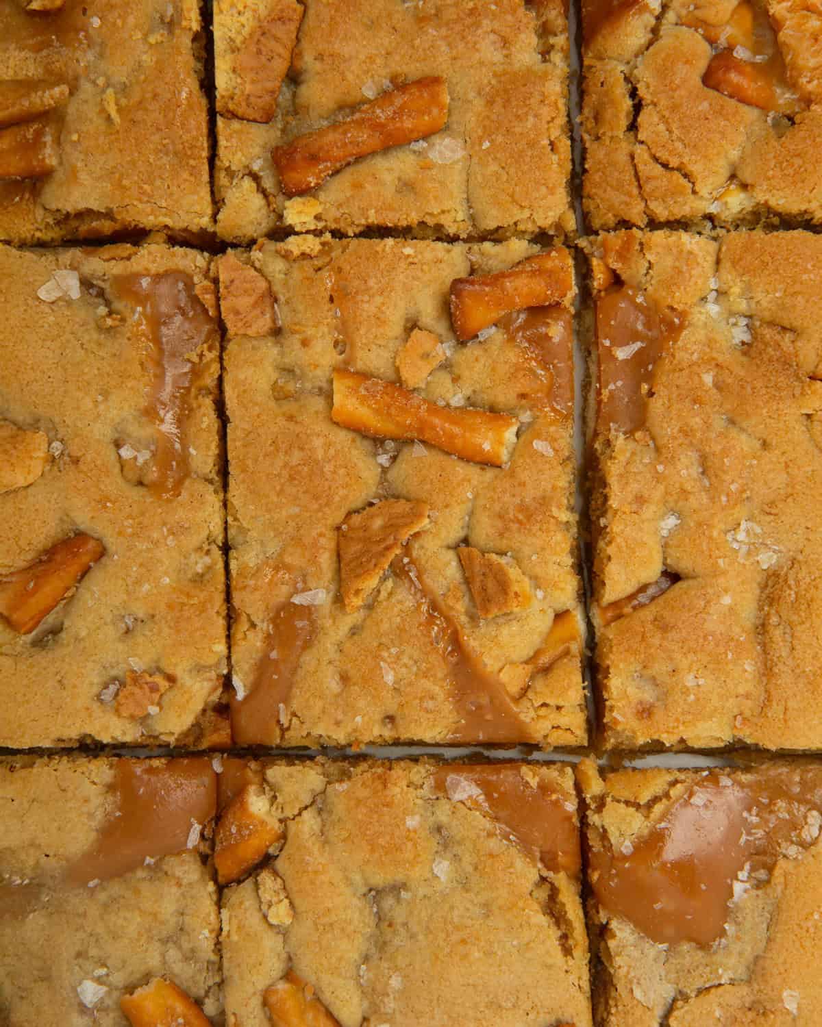 caramel apple kitchen sink cookie bars cut into rectangles