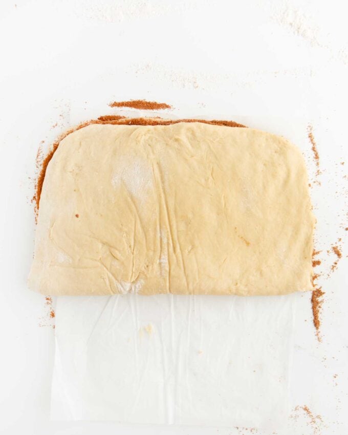 cinnamon roll dough folded in half
