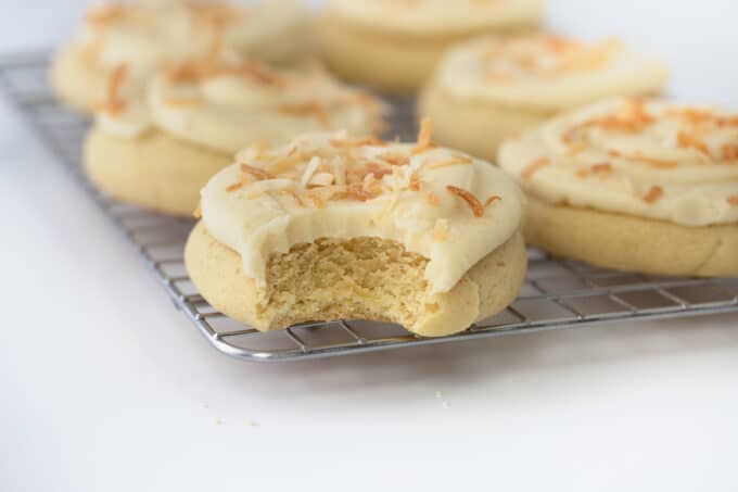 thick and fluffy coconut sugar cookies on a wire rack