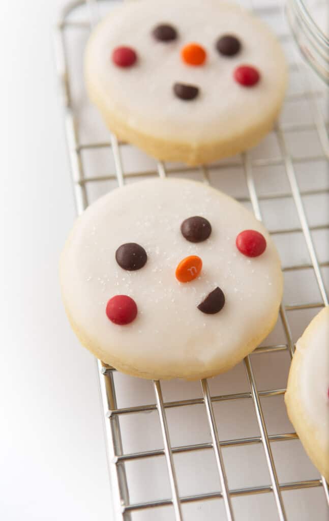 decorated snowman cookie with M&M face