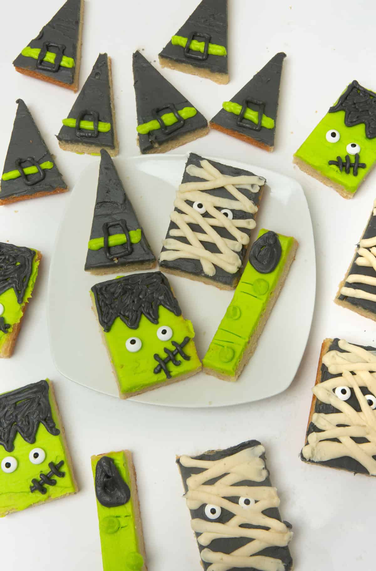 plate of decorated halloween sugar cookie bars