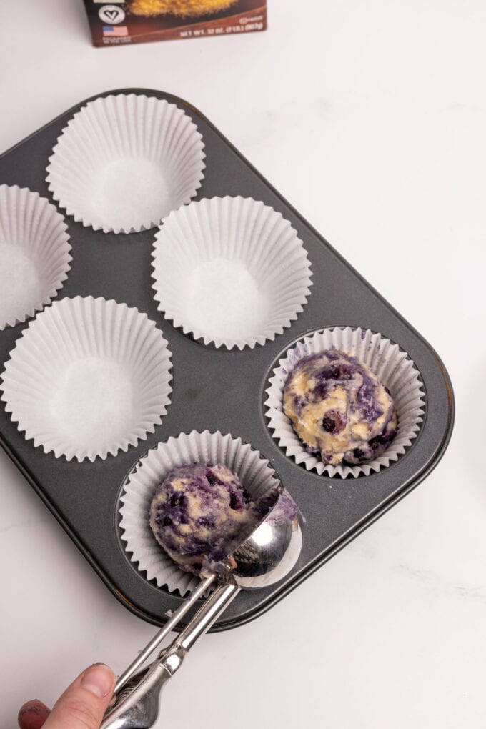Scoop blueberry muffin batter in jumbo muffin pan.