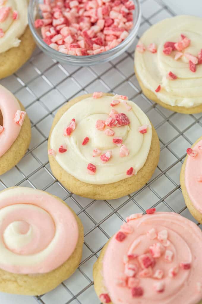 white frosted peppermint sugar cookies on wire rack