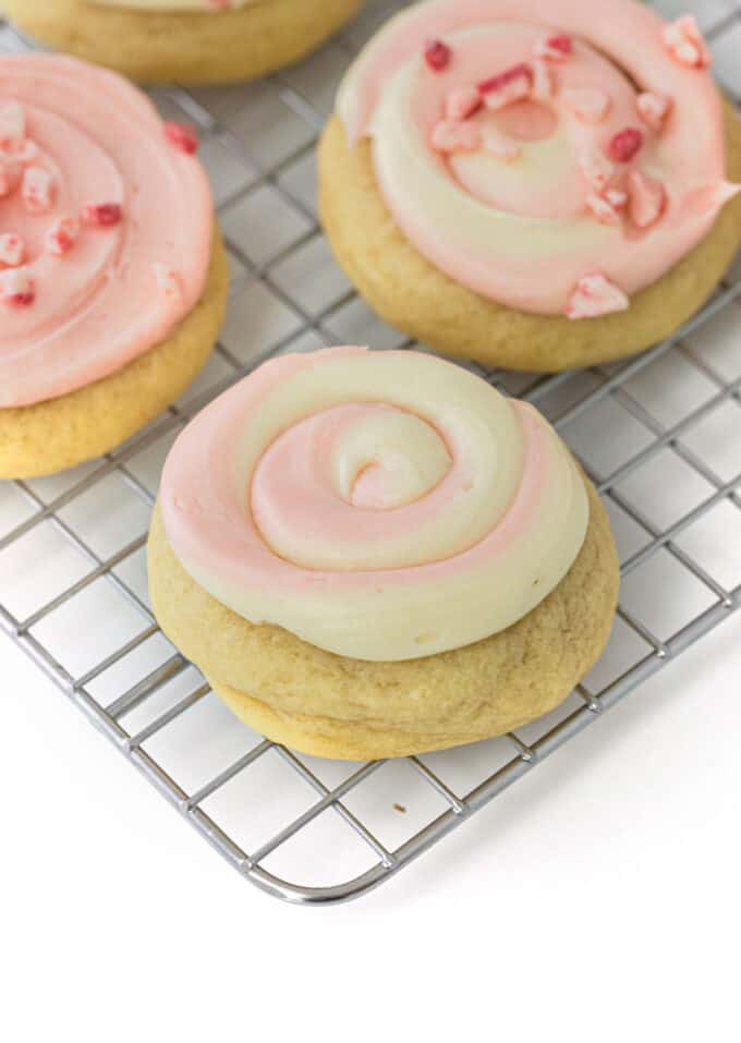frosted peppermint sugar cookie with pink and red swirl