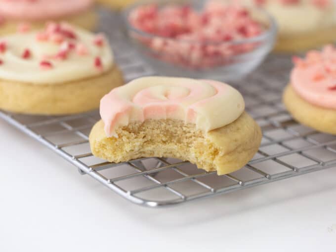 fluffy frosted peppermint sugar cookie with bite