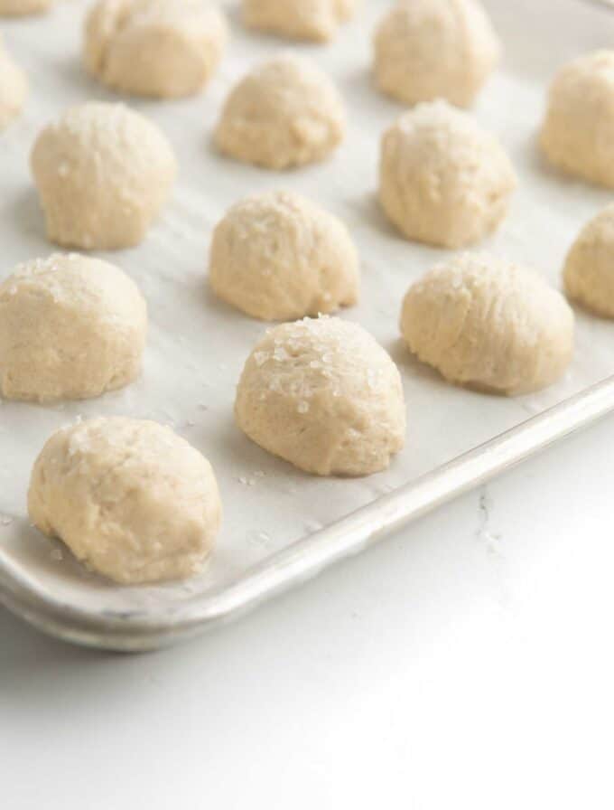 unbaked pretzel balls on baking tray