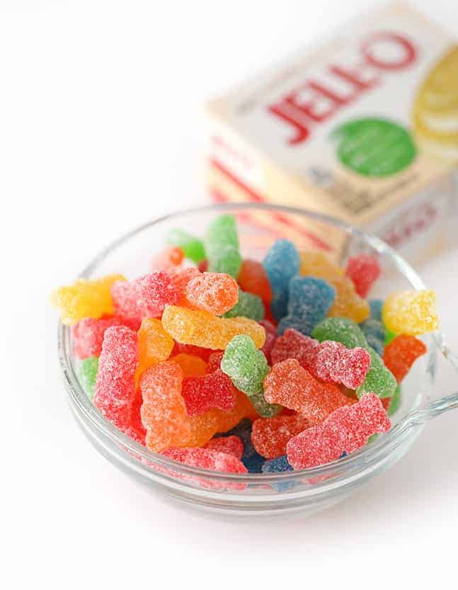Bowl of sour patch kids candy and vanilla pudding for sour patch kids cookies