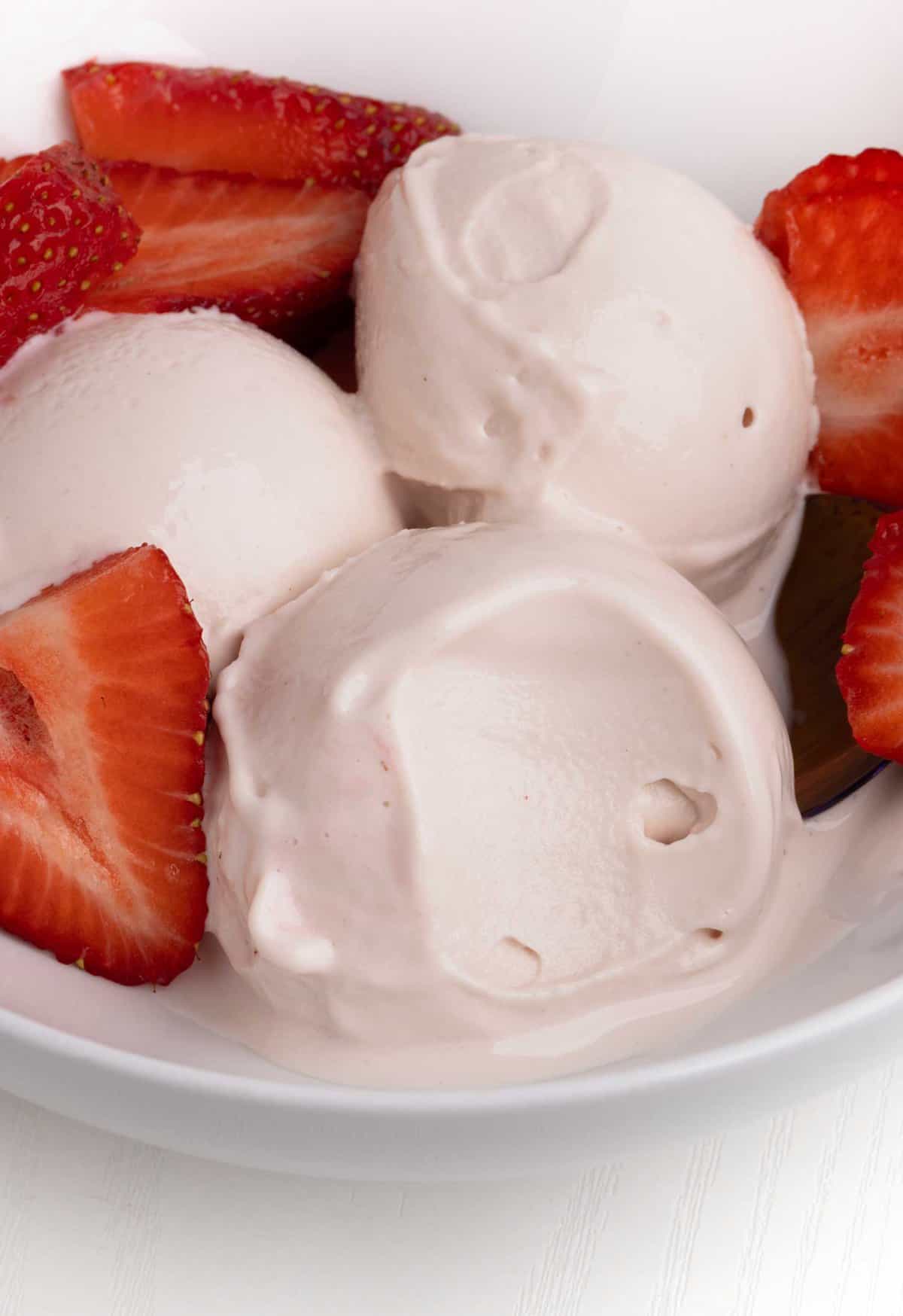 scoops of ninja creami strawberry frozen yogurt