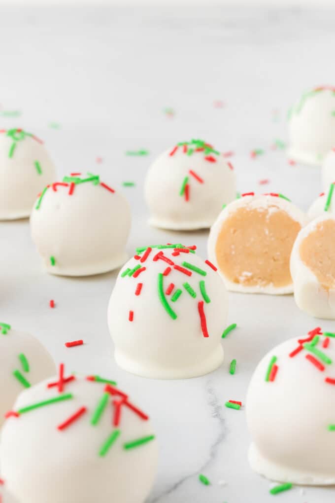 white chocolate sugar cookie truffles with red and green sprinkles